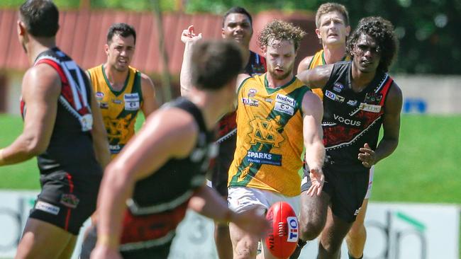 Dylan Landt kicks ahead as St Mary’s take on Tiwi Bombers. Picture: Glenn Campbell