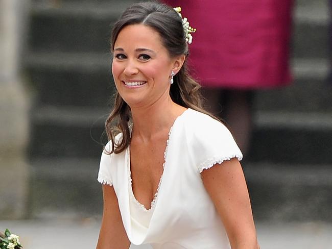 LONDON, ENGLAND - APRIL 29: Sister of the bride and Maid of Honour Pippa Middleton holds hands with Grace Van Cutsem and Eliza Lopes as they arrive to attend the Royal Wedding of Prince William to Catherine Middleton at Westminster Abbey on April 29, 2011 in London, England. The marriage of the second in line to the British throne is to be led by the Archbishop of Canterbury and will be attended by 1900 guests, including foreign Royal family members and heads of state. Thousands of well-wishers from around the world have also flocked to London to witness the spectacle and pageantry of the Royal Wedding. (Photo by Pascal Le Segretain/Getty Images)