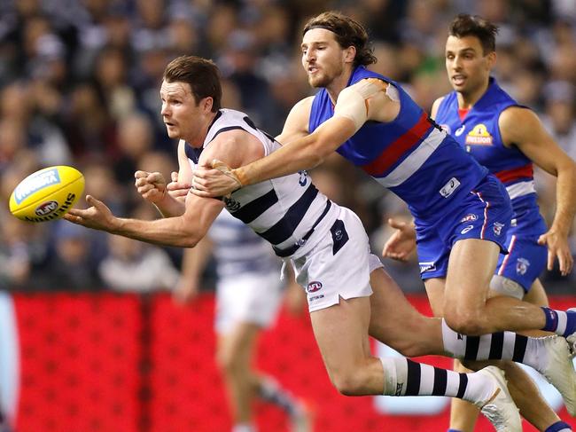 MELBOURNE, AUSTRALIA - JULY 06: Patrick Dangerfield of the Cats and Marcus Bontempelli of the Bulldogs in action during the 2019 AFL round 16 match between the Western Bulldogs and the Geelong Cats at Marvel Stadium on July 06, 2019 in Melbourne, Australia. (Photo by Michael Willson/AFL Photos via Getty Images)