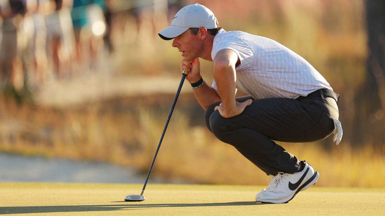 RIDGELAND, SOUTH CAROLINA – OCTOBER 23: Rory McIlroy of Northern Ireland lines up a putt on the 18th green during the final round of the CJ Cup at Congaree Golf Club on October 23, 2022 in Ridgeland, South Carolina. (Photo by Kevin C. Cox/Getty Images)