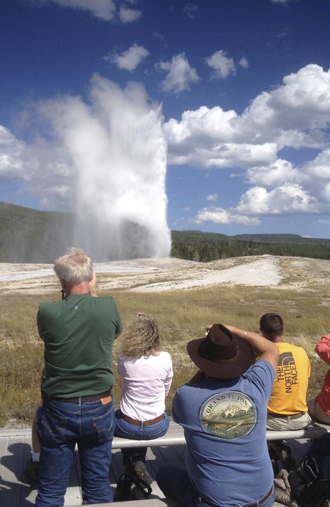 Visitors photographing Old Faithful geyser, which erupts every 91 minutes, unlike the less active Steamboat, which is more spectacular. Picture: Andy van Smeerdijk