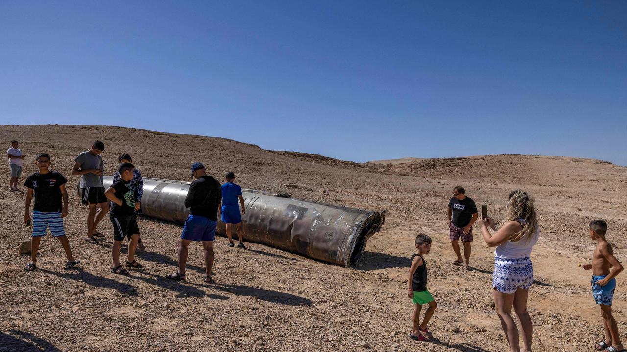 Guides say these visits are also about solidarity with the struggle. Picture: MENAHEM KAHANA / AFP.