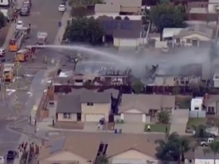 Multiple emergency vehicles rushed to the scene of a plane crash at Santee, a town near California. Picture: Twitter