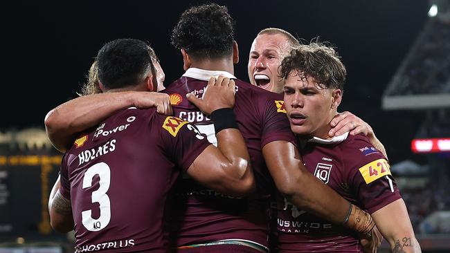 ADELAIDE, AUSTRALIA - MAY 31:  Selwyn Cobbo of the Maroons celebrates with team mates after scoring a try during game one of the 2023 State of Origin series between the Queensland Maroons and New South Wales Blues at Adelaide Oval on May 31, 2023 in Adelaide, Australia. (Photo by Cameron Spencer/Getty Images)