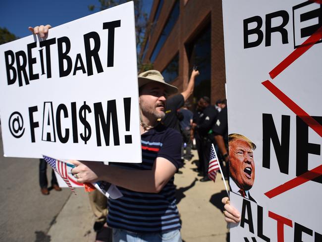 Protesters demonstrate on the street outside what they say is the offices of Breitbart News, formerly run by Trump administration chief strategist Stephen Bannon. Picture: AFP