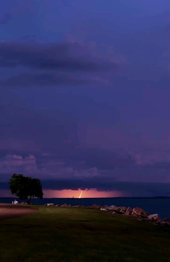 A bolt of lightning illuminates the waterfront during one of the Top End’s iconic thunderstorms. Picture: Ritu Porna