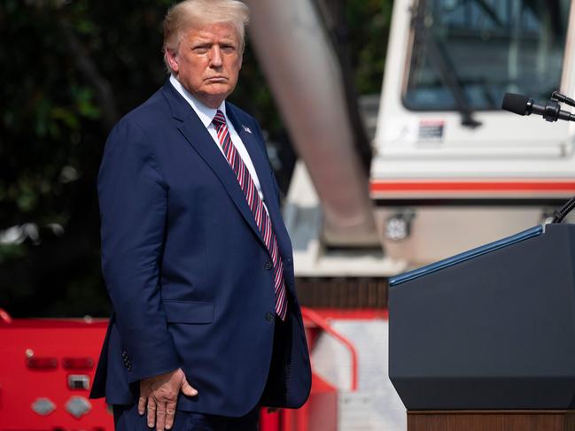 US President Donald Trump has let go of his tangerine locks for a more sedate silver. Picture: AFP