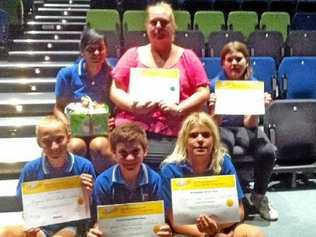 HEADLINER: Terrific teacher Karen Rantissi and her award- winning class from Empire Vale school.