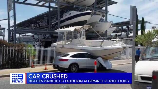 Luxury car crushed by boat outside WA storage facility (9NEWS)