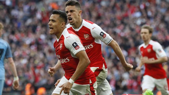 Arsenal's Alexis Sanchez celebrates.
