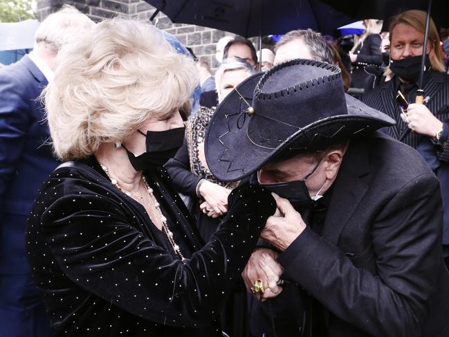 Molly Meldrum with Patti following the state funeral. Picture: Getty