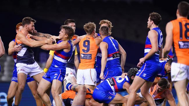 The Dogs and Giants getting stuck in! Picture: AAP Image/Scott Barbour