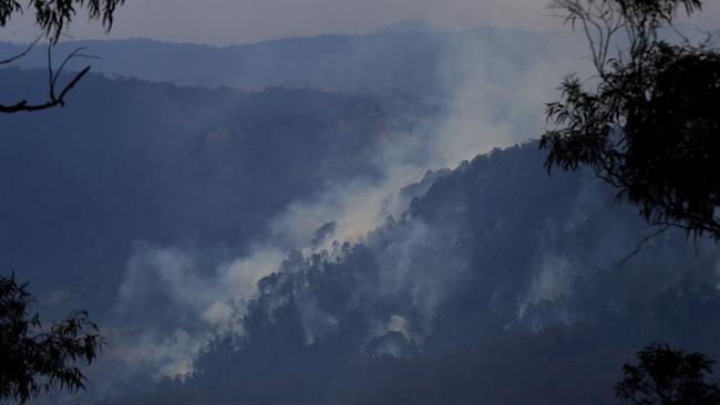 Smoke spiralling across the Scenic Rim. Picture: Adam Head