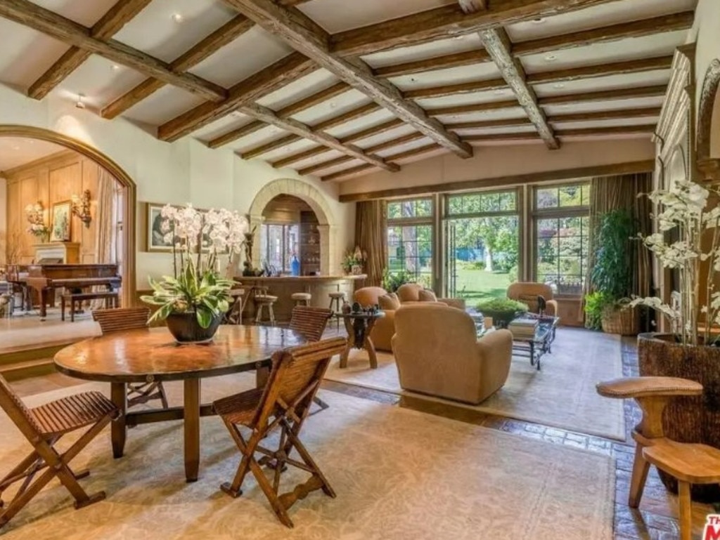 The estate also has waterfalls, a tennis court, a tree-lined cobblestone driveway and a courtyard with an outdoor fireplace. Picture: Realtor.com