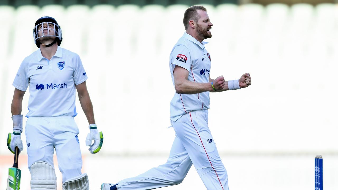 Nathan McAndrew celebrates one of his 10 wickets. Picture: Mark Brake/Getty Images
