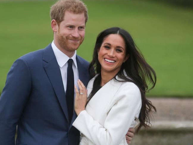 Prince Harry and Meghan Markle pose for photos at Kensington Palace after the announcement of their engagement in 2017. Picture: Daniel Leal-Olivas/AFP