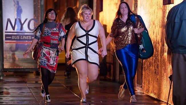 On top: Rebel Wilson, pictured with Super Fun Night co-stars Liza Lapira (L) and Lauren Ash (R).