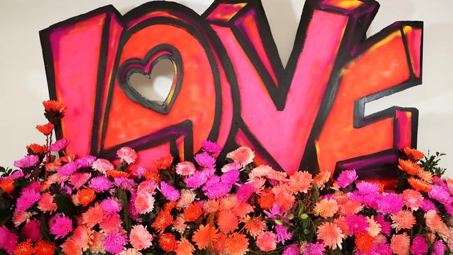 An artist created this mural with flowers as a surprise for the Main Beach residents. Picture: Jason O'Brien