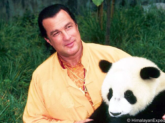 And we say goodbye from the quiz with a random photo of Steven Seagal with a panda.