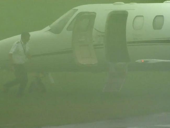 The pilot was seen running to the front of the plane to check on its condition. Image: Channel Nine