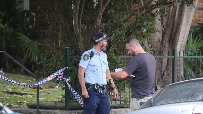 Police at the scene of the crime last year. Picture Rohan Kelly.