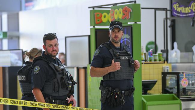 Police guard the crime scene of the stabbing of a young man at Elizabeth City Centre Wednesday. Picture: Mark Brake