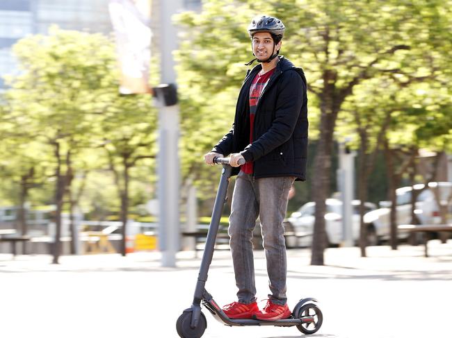 WEEKEND TELEGRAPHS SPECIAL. MUST TALK WITH PIC ED JEFF DARMANIN BEFORE PUBLISHING - Pictured is Zack D'Mello, 18, who is joining a push for an e-scooter trial at Sydney Olympic Park. Picture: Tim Hunter.