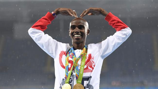 Gold medallist Britain's Mo Farah celebrates in Rio