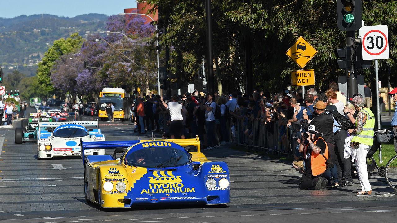 Race cars head down Wakefield Street through Victoria Square for the Adelaide Motorsport Festival’s Peak Hour of Power. Picture: Tom Huntley