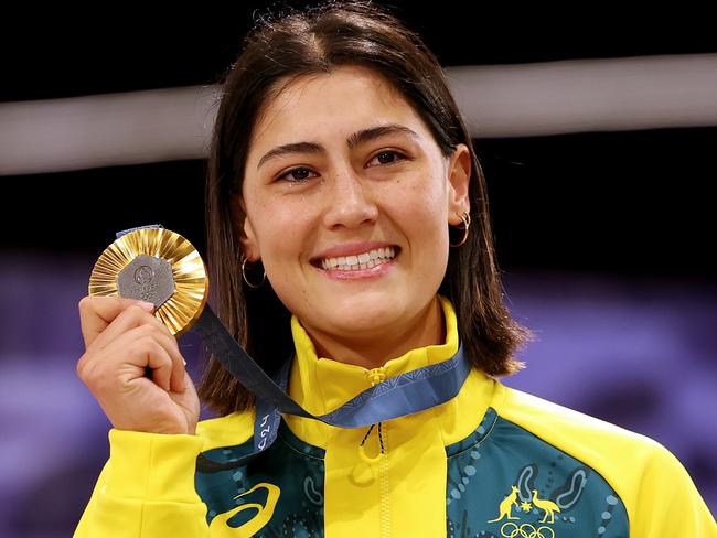 PARIS, FRANCE - AUGUST 02: Gold medalist Saya Sakakibara of Team Australia celebrates on the podium during the Women's Final on day seven of the Olympic Games Paris 2024 at Saint-Quentin-en-Yvelines BMX Stadium on August 02, 2024 in Paris, France. (Photo by Tim de Waele/Getty Images)