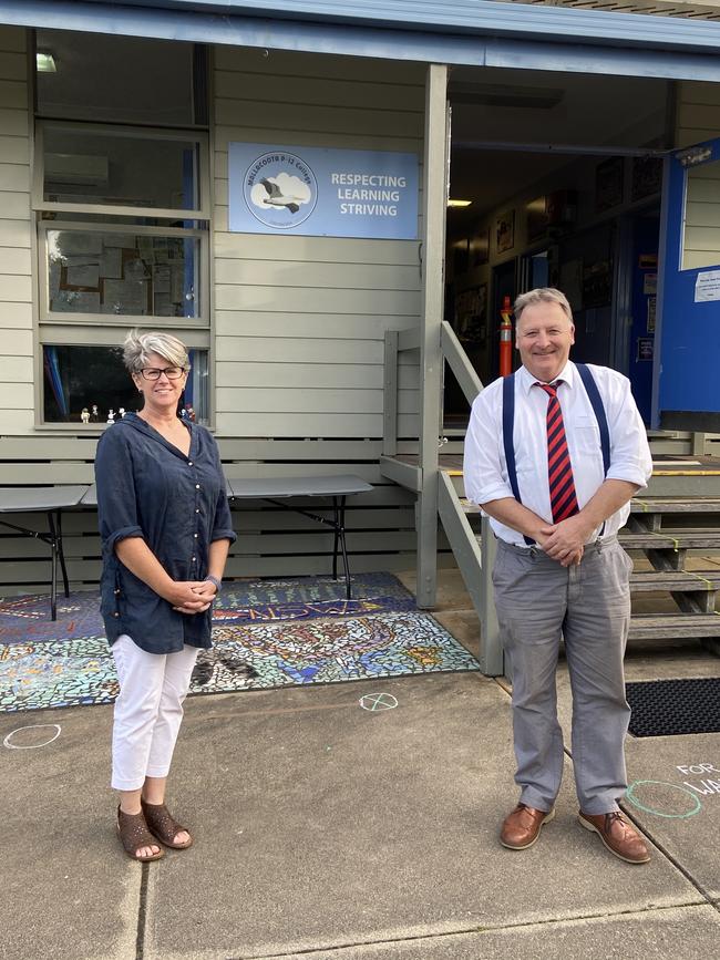 Mallacoota P-12 College principal Tim Cashmore practises social distancing with assistant principal Kathy Scott.