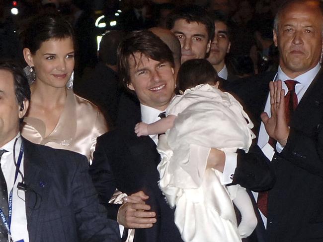 Tom Cruise, Katie Holmes and baby Suri in 2006. The star has been estranged from his daughter for much of her life. Picture: Getty Images