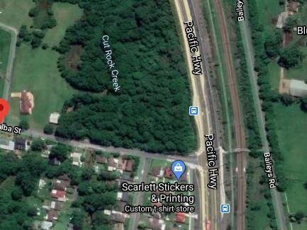 A man, 65, died, and his female passenger injured, when their car veered off the Pacific Highway at Lisarow near the intersection of Teralba St. Picture: Google