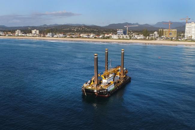 The giant Rock Dredge works on the Artificial reef just offshore from Nineteenth Ave Palm Beach. Picture Glenn Hampson