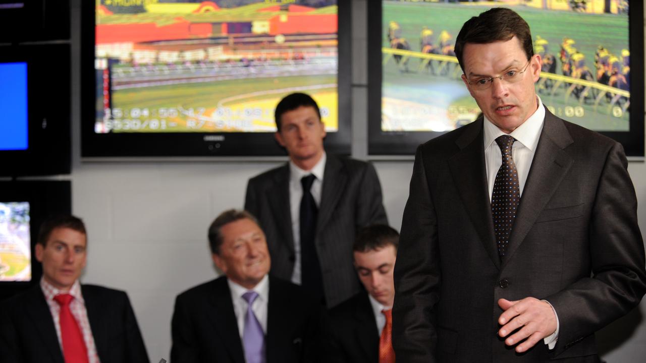 2008 Melbourne Cup. Flemington, Race 7. Irish trainer Aidan O'Brien defends his jockeys (from left) Johnny Murtagh and Wayne Lordan who sit alongside owner Derrick Smith and Colm O'Donoghue (standing) during the stewards hearing after the Flemington meeting yesterday.