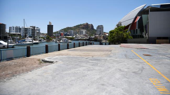 The mould-infested office and arcade is removed. Only the concrete floor remains. Picture: Shae Beplate.