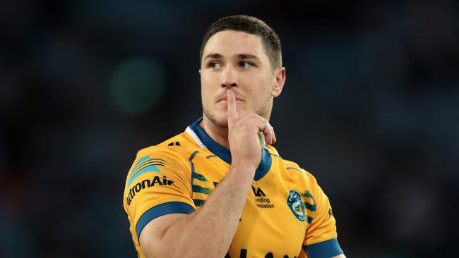 SYDNEY, AUSTRALIA - APRIL 10: Mitchell Moses of the Eels gestures to the crowd after kicking a conversion during the round six NRL match between Wests Tigers and Parramatta Eels at Accor Stadium on April 10, 2023 in Sydney, Australia. (Photo by Mark Metcalfe/Getty Images)