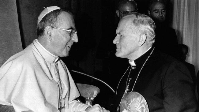 Pope John Paul I, left, greets then Cardinal Karol Wojtyla in September 1978.