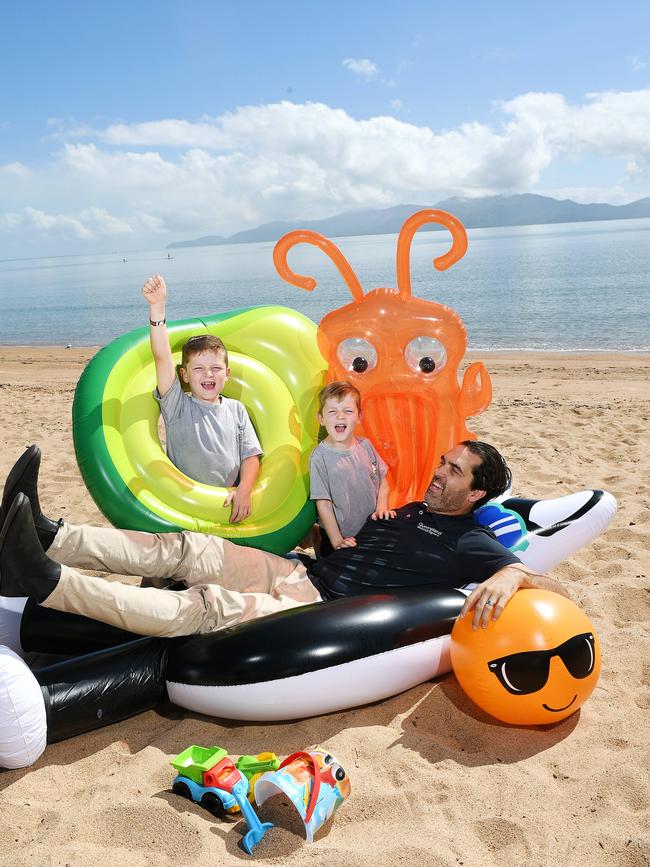 Brendan Cook, General Manager Townsville Airport, with his two boys Linc, 4, and Reed, 7, will be participating in the Townsville Airport Father's Day at Picnic Bay. Picture: Shae Beplate.