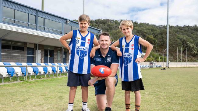 Patrick Dangerfield at his junior club, Anglesea, with 10 year old's Hugo Stickland and Albie Sheather. Picture: Brad Fleet