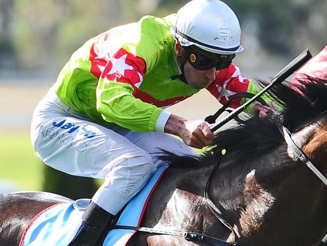 MELBOURNE, AUSTRALIA - JUNE 15: Steven Arnold riding Prince Harada defeats Jamie Mott riding Boer in the Alternate Railway Handicap during Melbourne racing at Moonee Valley Racecourse on June 15, 2013 in Melbourne, Australia. (Photo by Vince Caligiuri/Getty Images)