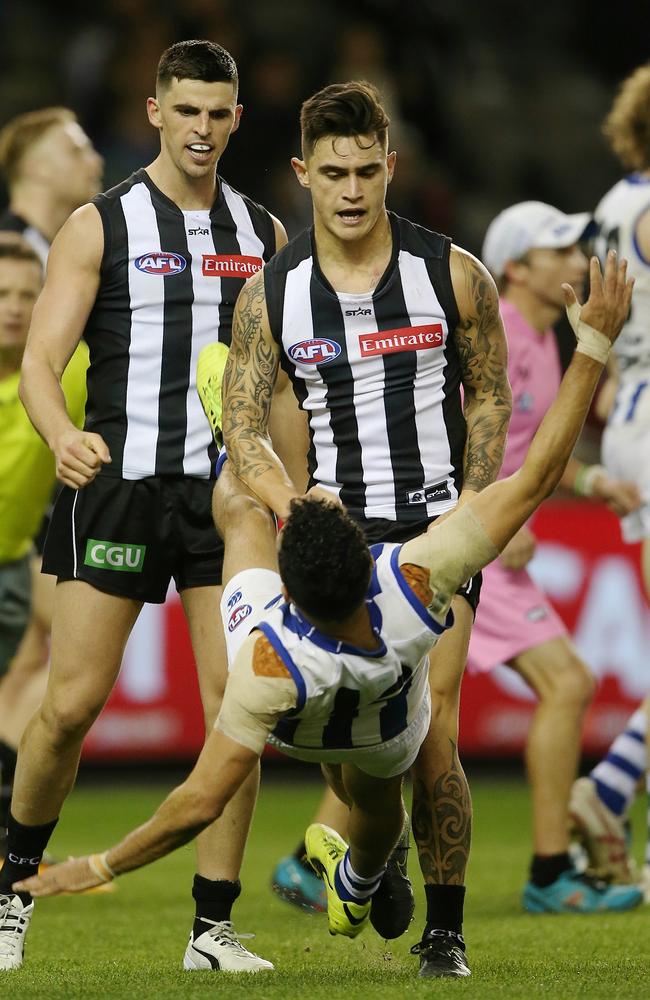 Marley Williams shoves Lindsay Thomas in the third quarter which coast his team a goal. Picture: Wayne Ludbey