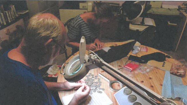 Turnstone Archaeology's Michael Strong, in the middle of the painstaking work that was grading coins.