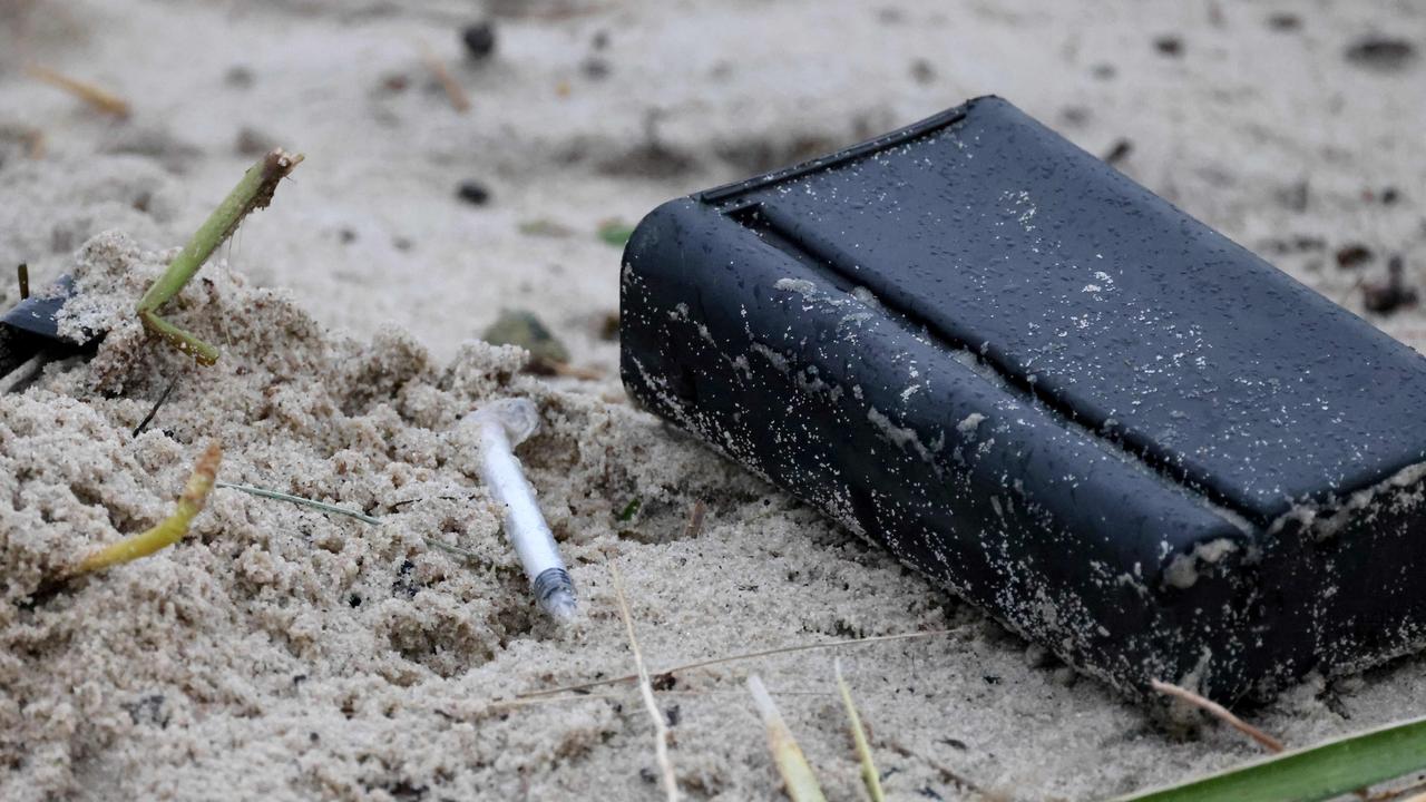 A syringe on the beach. Picture: Damian Shaw