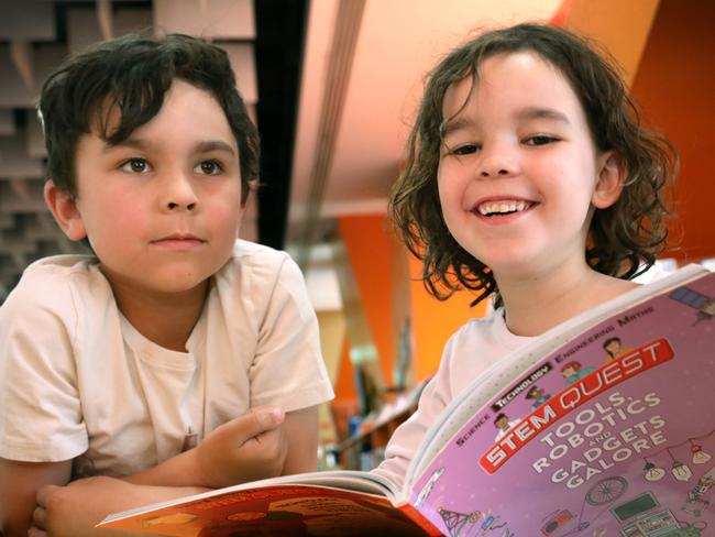 The Premier is wanting to get Nuclear programs into primary and high schools. At Marion Library, getting a head start, are brother and sister, Emilian,8, and Hira Efatmaneshnik,6. 19 March 2023. Picture Dean Martin