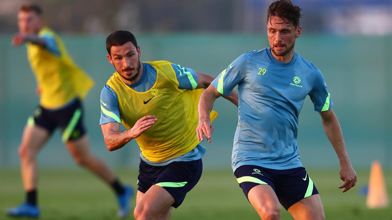 Mathew Leckie and James Holland during a Socceroos training session in Dubai.