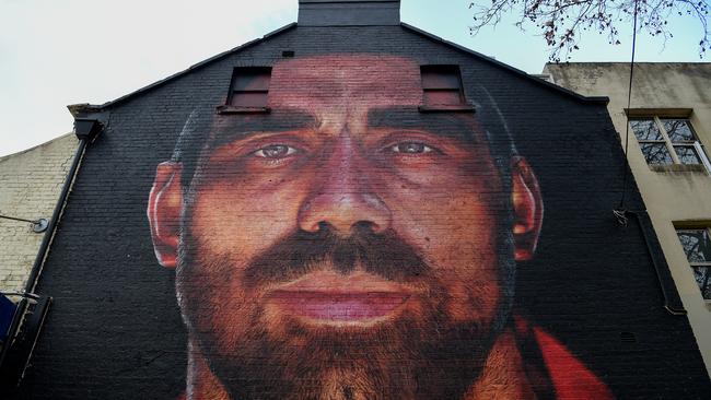 A mural of Aboriginal former AFL player Adam Goodes in Surry Hills, Sydney. Picture: AAP