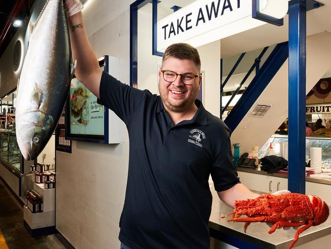 Alex Knoll with popular seafood over Easter at Angelakis Bros in the Adelaide Central Market, Saturday, March 13, 2021. Picture: MATT LOXTON