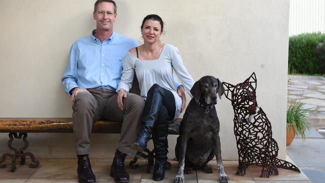 Liberal politician Dan van Holst Pellekaan, member for Stuart, with his wife Rebecca and dog Alex at their home in Wilmington. Picture: Naomi Jellicoe