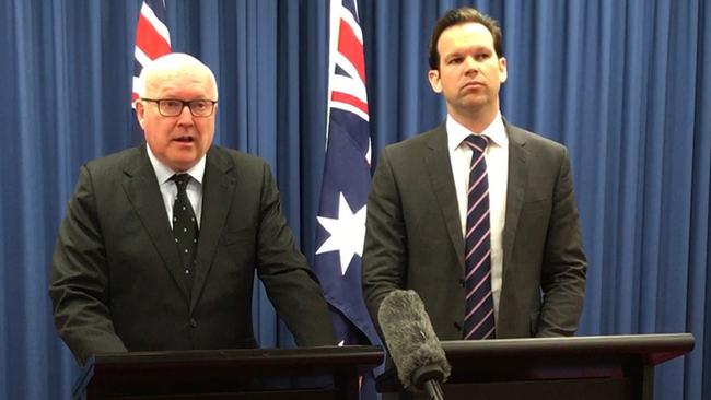 Senator Matt Canavan (right) at yesterday’s media conference with Attorney-General George Brandis. Picture: Sonia Kohlbacher/AAP